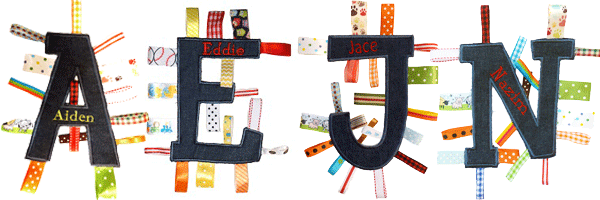 This is Embroidered Tag Along Letter Toy