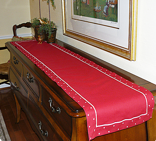 This is Red Swiss Dot Linen Holiday Table Runner